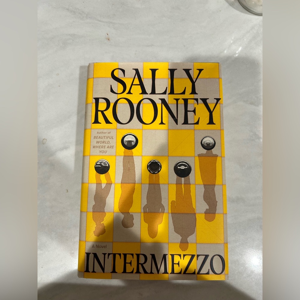 Sally Rooney Novel with Yellow and Gray Cover